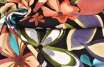 Jerseyprint Blumen schwarz bunt gedreht