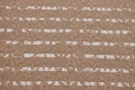 Spitze Graubeige
